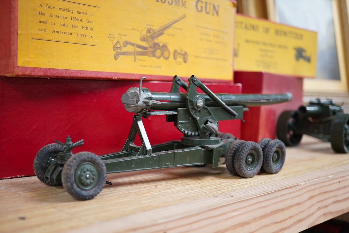 Three boxed Britains military field guns; a 4.7” Naval Gun, mounted for field service (No.1264), an 18” Howitzer (No.2107), and a 155mm Gun (No.2064), all with some accessories and shells missing